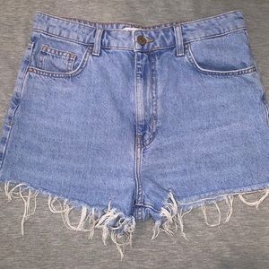 Distressed high-rise light washed Jean shorts